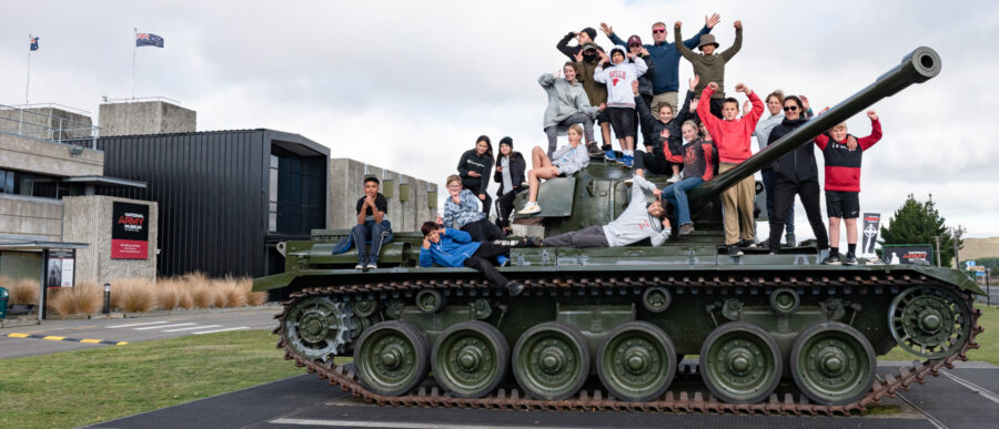 Kids posing on the Centurion outside the Museum